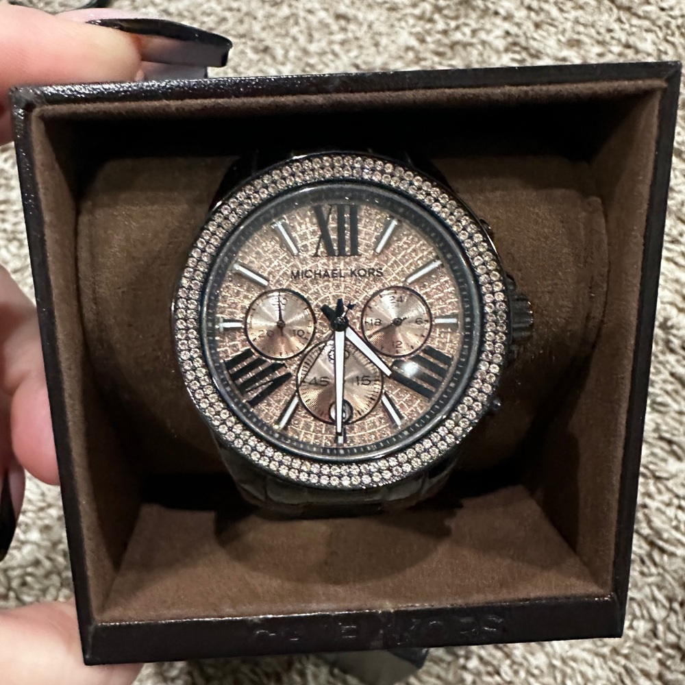 Rose gold and black Michael kors watch